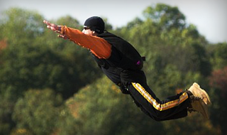 A BASE jumper leaves the bridge ... voluntarily. Bridge Day BASE Jumpers