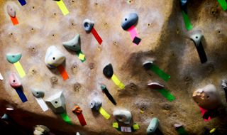 Climbing holds on an Eldorado Wall Climbing holds are marked to indicate the route