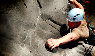 Climber on eldorado walls Man-made climbing walls can be as challenging as natural rock.