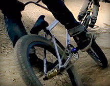 Railing the berm on the BMX track at the Summit