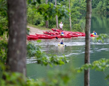 Instructors prepare to present a Basic Kayaking course on Tridave Lake.