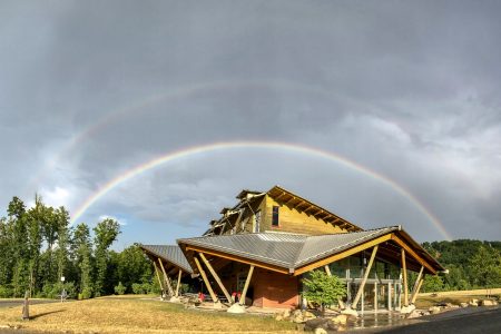 A double rainbow forms over Scott Visitor Center, illustrating how West Virginia, and the Summit Bechtel Reserve, is "Almost Heaven!"