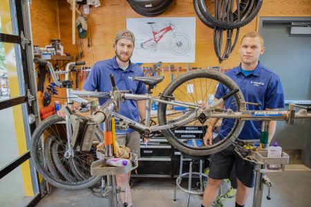 Trained staff at Harvey Family Mountain Bike Shop work tirelessly to keep equipment in great working order.