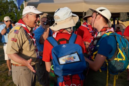 Doyle Parrish, left, interacts with Scout participants during the 2019 World Scout Jamboree.
