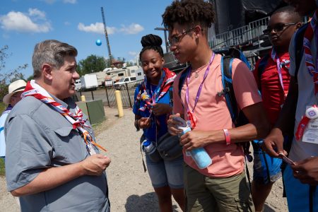 Jim Turley engages international Scouts at the Summit Bechtel Reserve during the 2019 World Scout Jamboree.