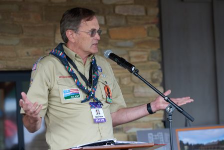 Joe Crafton introduces the festivities at the dedication ceremony for Fork in the Road Diner and Eagle's Nest Lodge at the Summit Bechtel Reserve.