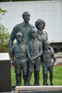 The bronze statue honoring Robert and Brenda Murray and their family stands at the Summit Bechtel Reserve.