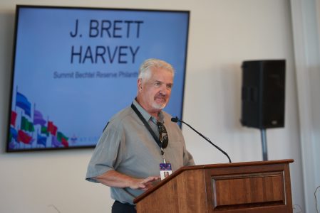 Brett Harvey addresses a group of philanthropists and guests during the 2019 World Scout Jamboree.