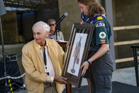 J.W. Marriott Jr. reacts to receiving a sketch of the bronze statue erected in his honor at the Summit Bechtel Reserve.