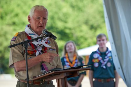 Frank McAllister delivers a special poem in honor of his friend and fellow Summit Bechtel Reserve philanthropist Si Brown at the dedication ceremony for the Si and Eaton Brown bronze during the 2019 World Scout Jamboree.