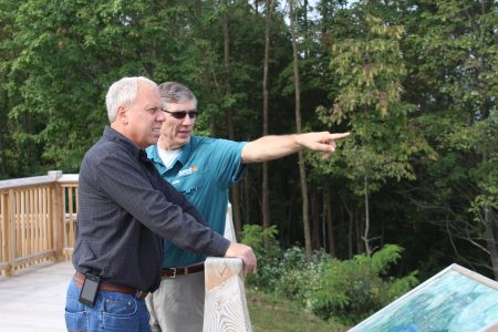 Steve Antoline, left, and Wayne Perry survey Scott Scouting Valley from WP Point during the 2013 National Scout Jamboree.