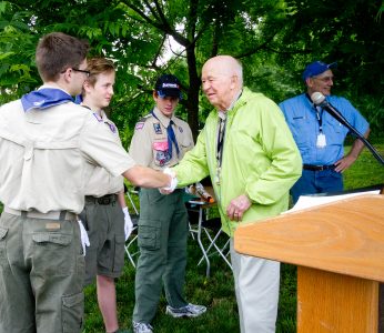 Bechtel shakes hands with Scout