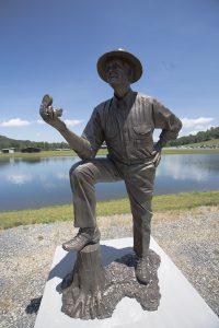 Bronze depicting John Tickle along the banks of Tickle Lake near John D. Tickle Base Camp