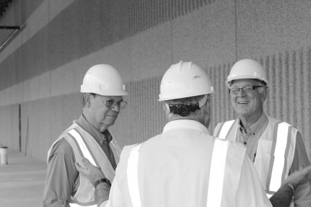 Phil Condit, far left, at the dedication ceremony for the Edward H. and Jeanne Arnold Logistics Center