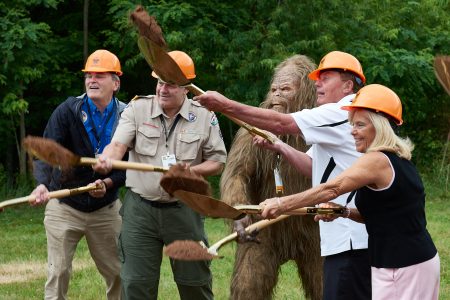 BSA philanthropists, from left, Joe Crafton, James Turley, Sasquatch, Jack Link, and Mary Jo Link break ground for Jack Link's Scout Pavilion in 2018.