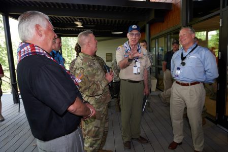 Summit Bechtel Reserve philanthropists Rex Tillerson (left), Wayne Perry (third from left), and Ross Perot Jr. (right) chat with WV National Guard General Hoyer after the dedication of Rex W. Tillerson Leadership Center at the World Scout Jamboree in 2019.