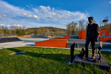 The bronze depicting John Harkey stands near the John D. Harkey, Jr. X-ZONE.