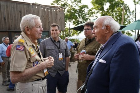 Summit Bechtel Reserve philanthropists Charles M. PIgott, left, and Robert E. Murray chat on the deck at WP Point in 2018.