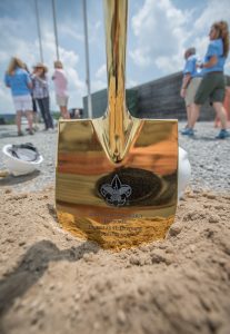 A gleaming ceremonial shovel used during the groundbreaking for Douglas H. Dittrick Flag Plaza